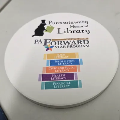 Ceramic Coasters - This just sits on my desk to remind me to maintain our Gold Level Programming for PA Libraries status