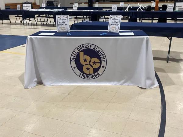 We had our parent orientation for the first day of school We used the tablecloth on our parent sign-in table with a blue cloth draped across the top as a runner
