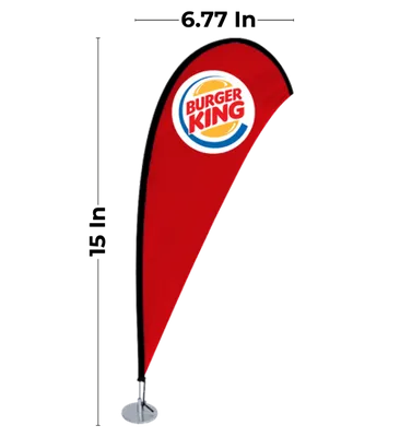 A teardrop-shaped promotional banner featuring the 'Burger King' logo stands upright, affixed to a base on a plain background.